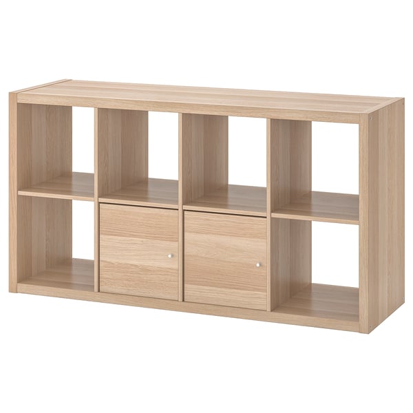 KALLAX oak shelving unit with open compartments for storage.