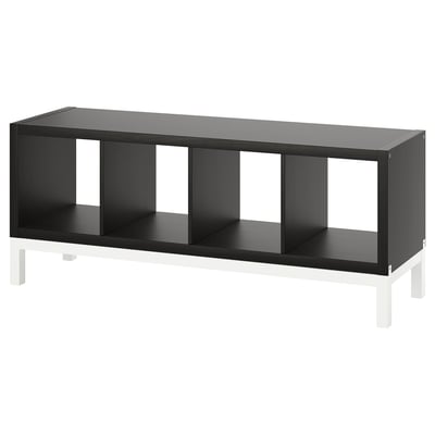 Black KALLAX shelving unit with four compartments and white legs.