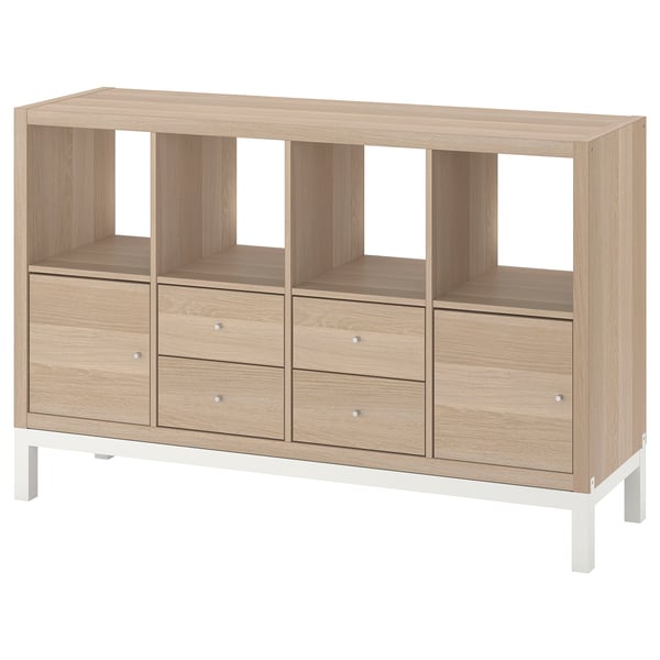 Oak KALLAX shelving: 3 drawers, 3 shelves, white base.