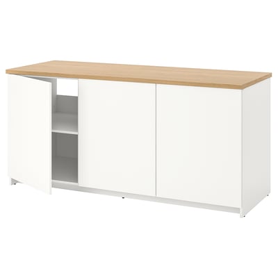A KNOXHULT white modular kitchen cabinet with light wood countertop.