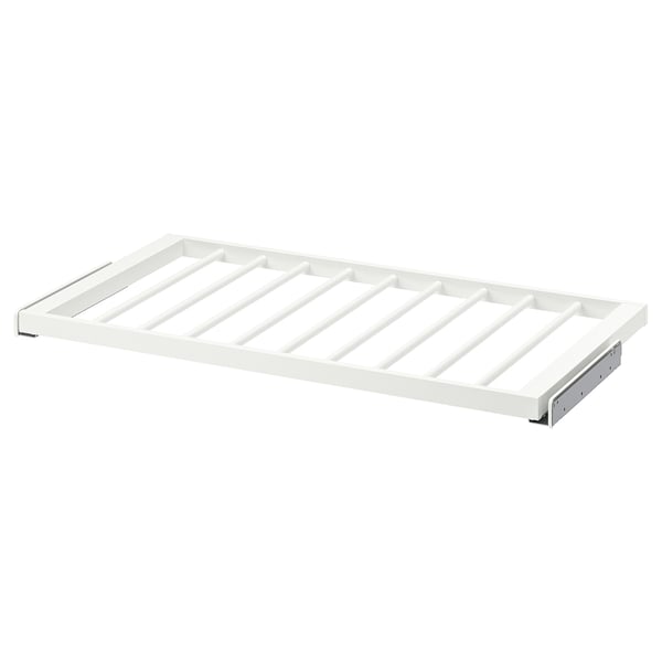 A white KOMPLEMENT trouser hanger shelf. It has a rectangular shape with slatted design, made of epoxy-coated steel.