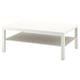 A white LACK side table with a glass top and lower shelf. Its square-shaped with metal legs.