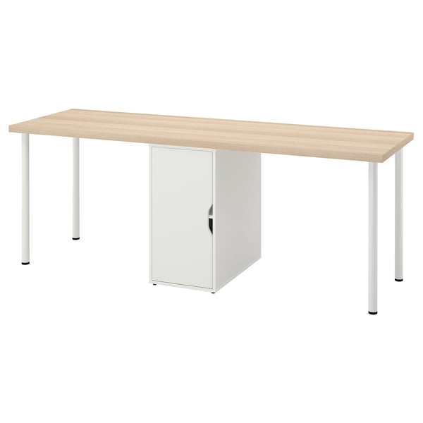 An ikea LAGKAPTEN desk, light brown top, white metal legs, with a white storage cabinet.
