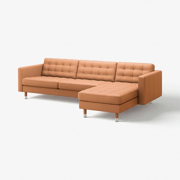 Brown leather sectional sofa with tufted cushions and chrome legs.