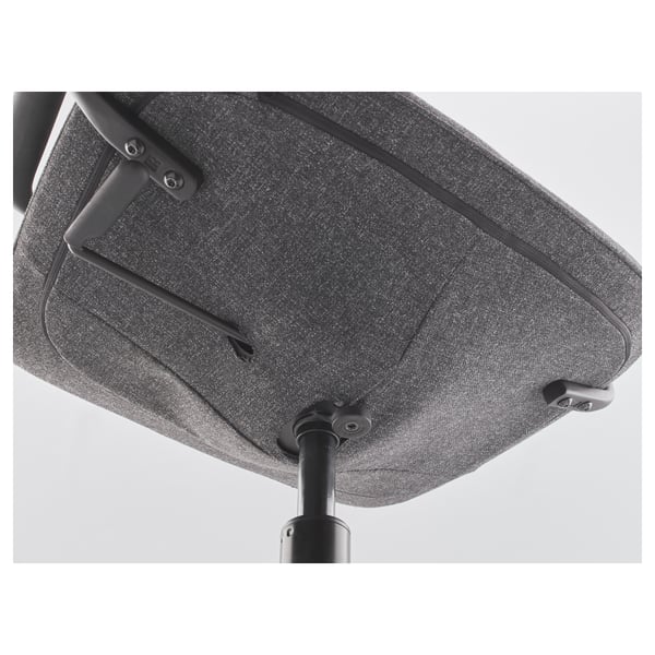 The LÅNGFJÄLL office chairs underside shows durable polyester fabric and sturdy metal mechanisms, emphasising its quality and comfort.