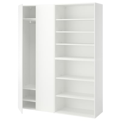 Two tall white modular storage units with empty shelves and compartments for versatile use.