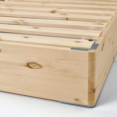 Wooden mattress base with metal hinges, assembled from panels. Sturdy, light, and supportive structure for bed.