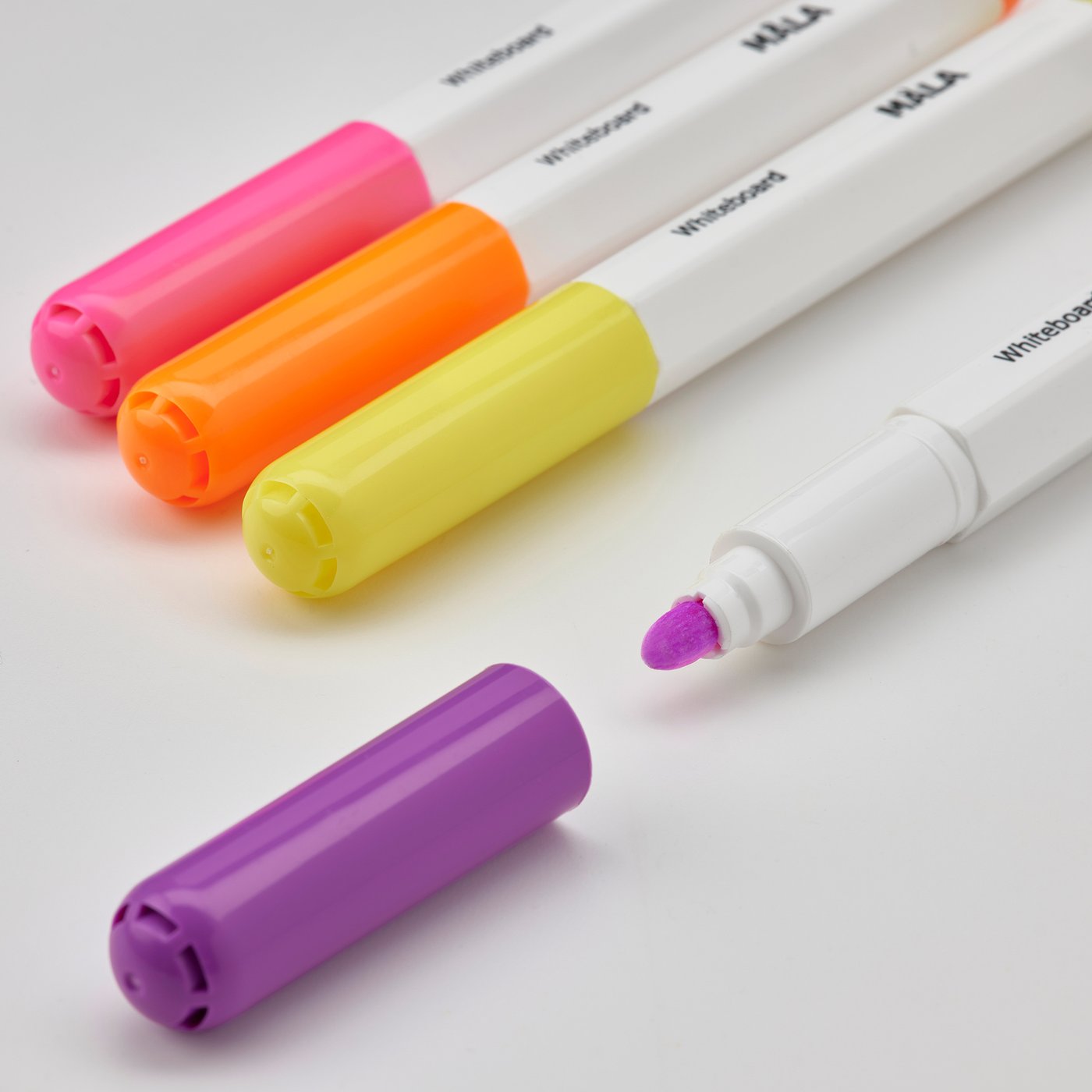 Bright, colourful set of MÅLA whiteboard pens, designed with child-friendly grips, lying on a clean surface.