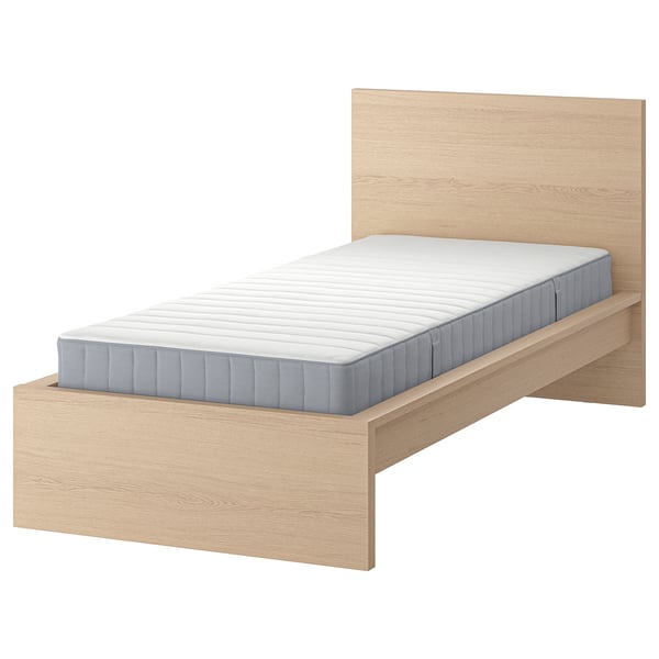 Light wooden MALM bed with blue mattress.