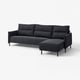 An l-shaped charcoal grey MANNARP sofa with a sleek, modern design and comfortable cushions.