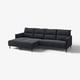 Modern dark grey l-shaped sofa with high back, soft cushions, and black metal legs.
