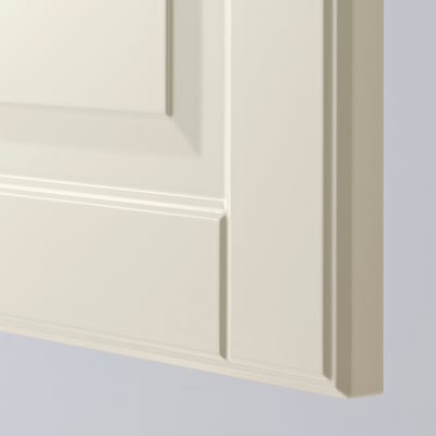 Close-up of smooth, off-white cabinet door with bevelled edges, part of METOD kitchen system.