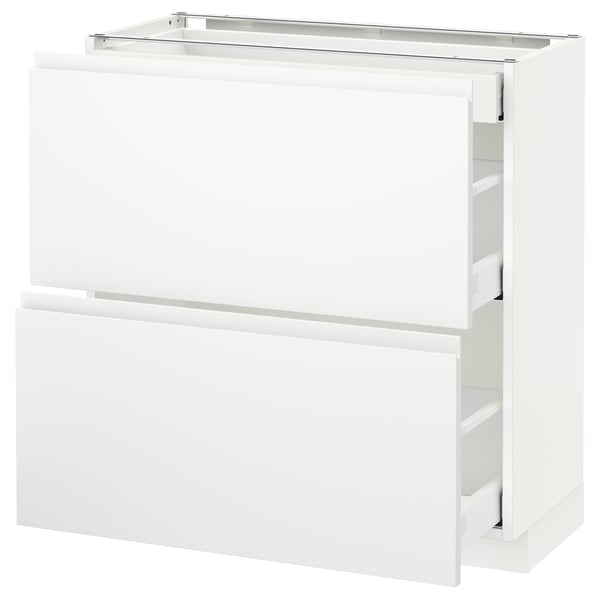 White METOD kitchen cabinet with voxtorp fronts, sleek minimalist design, two drawers and one shelf.
