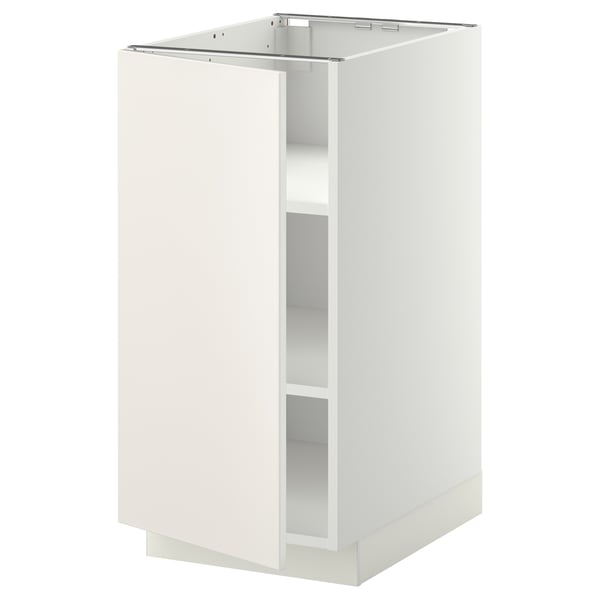 A white METOD kitchen cabinet with smooth surfaces and minimalist design, featuring adjustable shelves.
