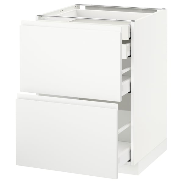 White kitchen cabinet with drawers, minimalist design.