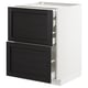 A white METOD kitchen cabinet with dark wood drawers. The drawers have bevelled edges and run smoothly.