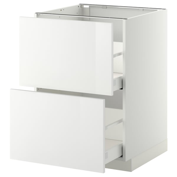 A white METOD kitchen cabinet with two open drawers. The cabinet a modern, glossy design.