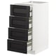 Modern METOD kitchen cabinet with black drawers, dark wood.