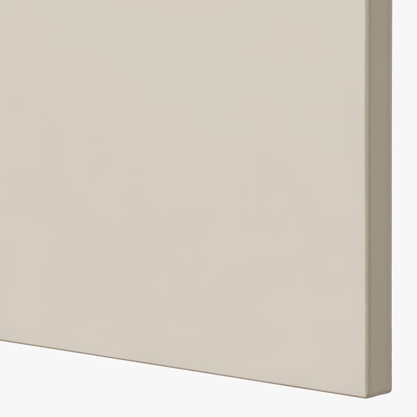Clean, minimalistic beige kitchen cabinet corner, showing smooth finish and sturdy design.