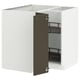Modern kitchen unit METOD with dark brown door, white body, and black metal shelves.