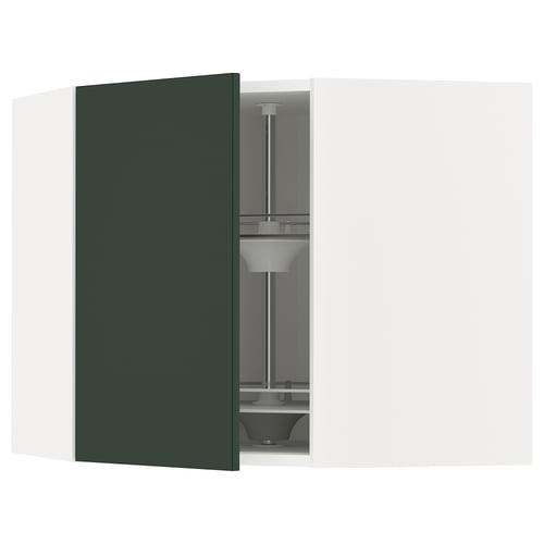 A modern green kitchen cabinet with a glass shelf, part of the ikea METOD system, showcasing contemporary design.