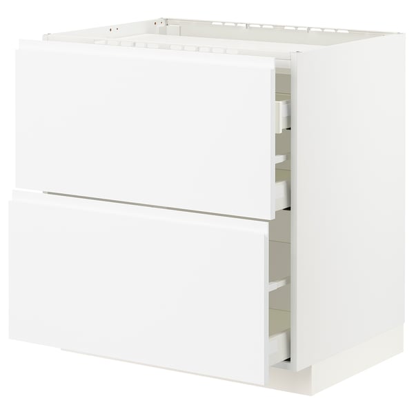 The METOD kitchen cabinet is white, rectangular, with two drawers and minimalist design featuring integrated handles.