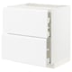 The METOD kitchen cabinet is white, rectangular, with two drawers and minimalist design featuring integrated handles.