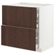 White & dark brown kitchen cabinet with sleek wooden handles and smooth drawers.