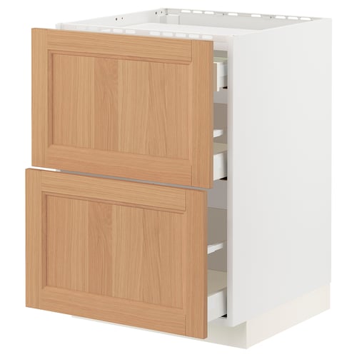 A METOD kitchen cabinet with vedhamn oak fronts. It has two drawers and a white frame. The cabinet is rectangular with a natural wooden finish.