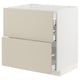 Displays a beige METOD kitchen cabinet with two full-extension drawers, featuring a sleek and modern design.