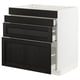 Modern kitchen cabinet, black & white, three drawers, sleek design, sturdy wood.