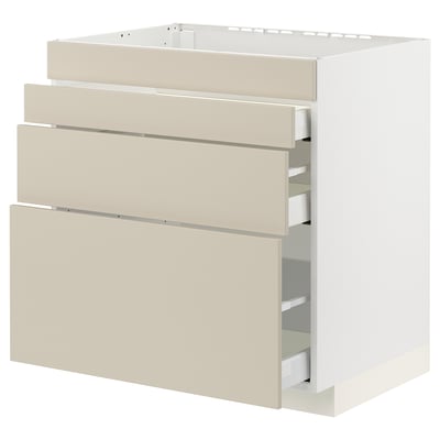 Beige METOD kitchen cabinet with smooth drawers, sleek minimalist design.