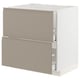 METOD kitchen cabinet in beige with smooth grey handles and modern design.