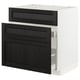A black stained wooden drawer unit from the METOD kitchen system, featuring clean lines and bevelled edges, set against a white cabinet frame.