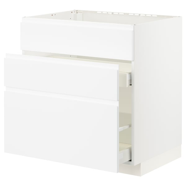 White METOD cabinet with smooth drawers, minimalist design.