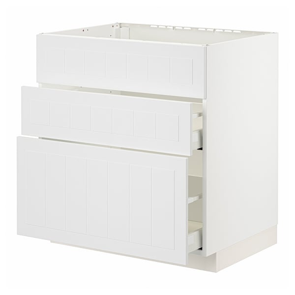 METOD kitchen unit in white with two open drawers.
