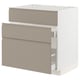 A sleek, modern kitchen cabinet in matte grey-beige with two drawers and a boxy shape. It integrated handles and a minimalist, flat design.
