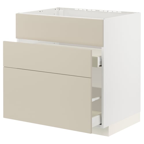 Modern beige kitchen cabinet with smooth, minimalist design and full-extension drawers.
