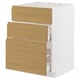 A modern, white METOD kitchen cabinet with oak-colored drawers and built-in handles. Its vertically aligned with three open drawers.