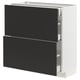 Modern black METOD kitchen cabinet with white frame, square shape, and sleek drawers.