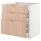 METOD kitchen unit with three light wood drawers.