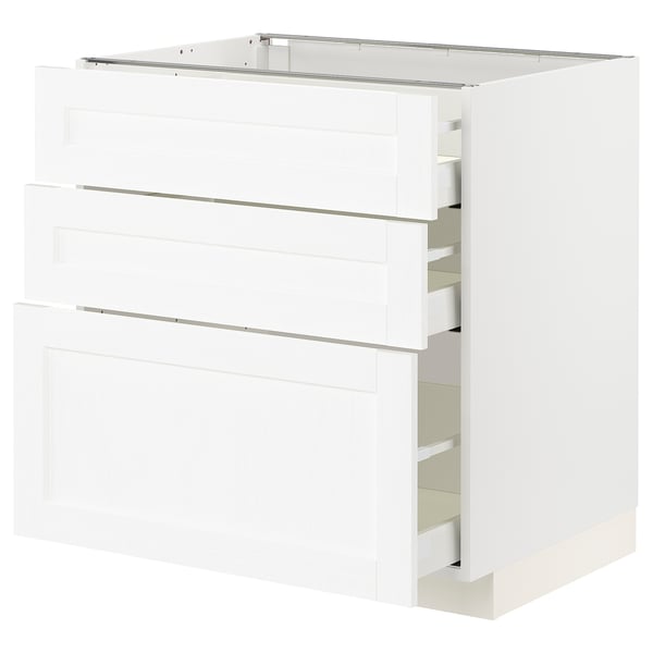 White kitchen cabinet with pull-out drawers.