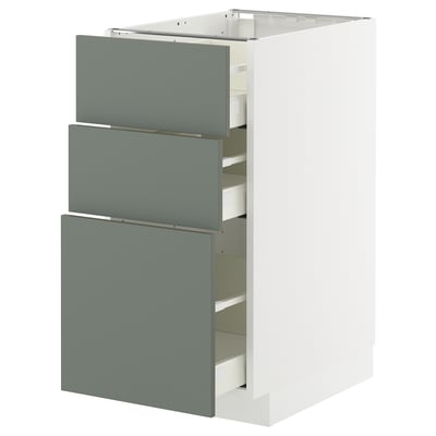 White METOD kitchen unit with 3 grey-green drawers.