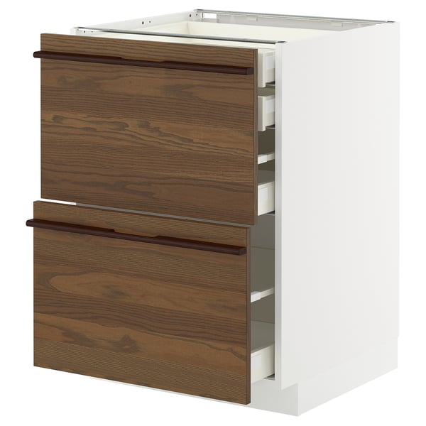 White METOD kitchen cabinet with dark brown wooden drawers and handles.