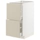 White METOD cabinet with beige havstorp drawers.