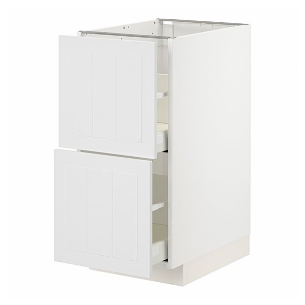 White METOD kitchen cabinet with two open drawers and a door.