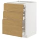 A METOD kitchen unit with three oak effect drawers, white base, and sleek, integrated handles.