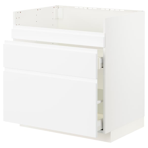 White METOD kitchen unit, modern minimalist design, multiple storage sections.