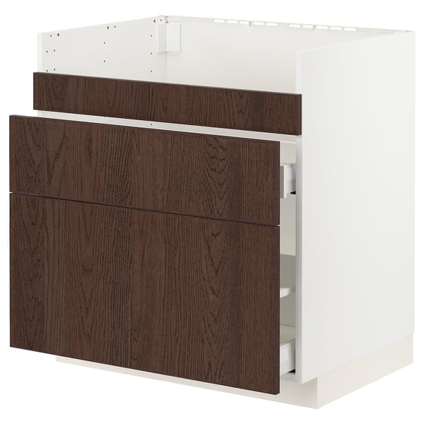 White and dark wood kitchen unit with drawers.