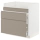 Modern kitchen cabinet with beige-beige drawer fronts and minimalist handles, featuring integrated handles and chamfered edges.